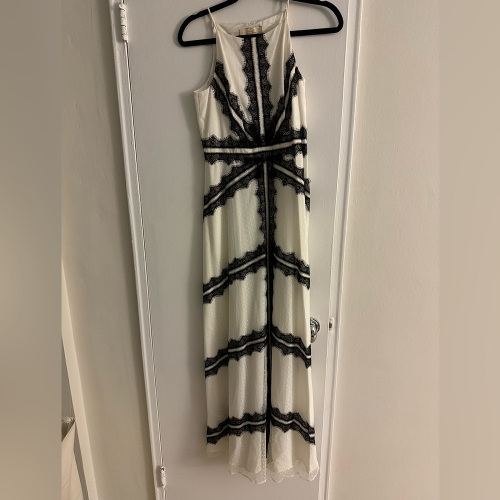 White spotted lace with black classic lace design Aidan Maddox evening gown